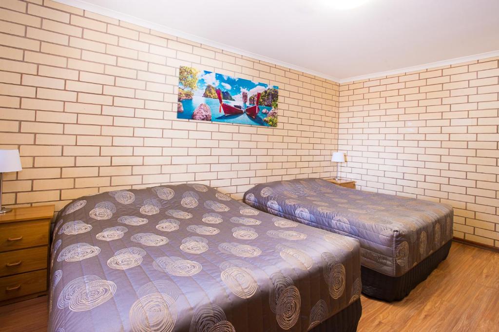 Standard Twin Room with queen and single bed